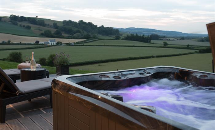 Relax and unwind in your luxurious private hot-tub